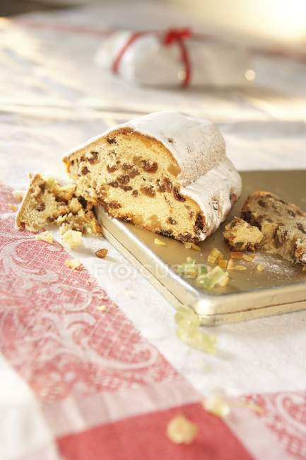 Sliced Stollen with icing sugar — Stock Photo