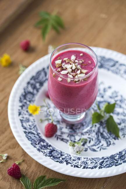Raspberry smoothie with almonds — Stock Photo