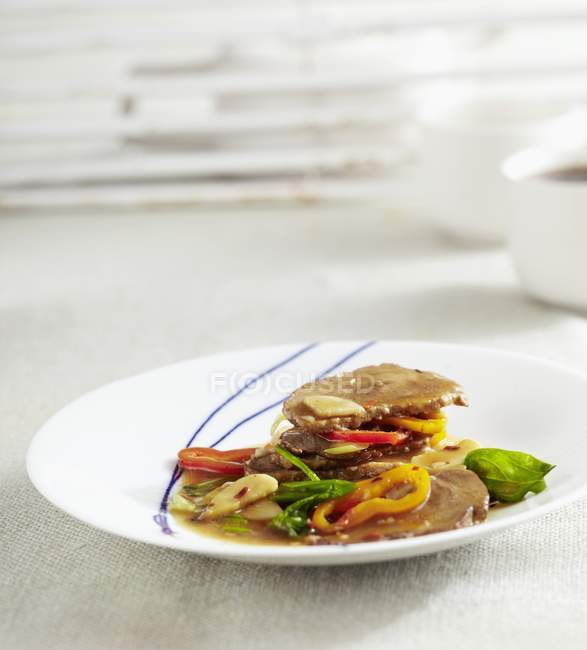 Closeup view of duck breast with king trumpet mushrooms — Stock Photo