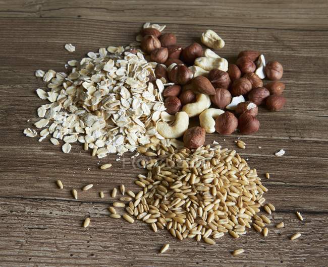Nuts with grains and oats — Stock Photo
