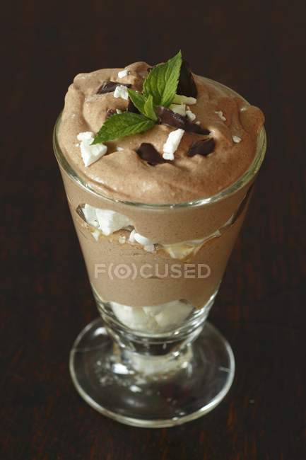 Chocolate cream with meringue and mint — Stock Photo