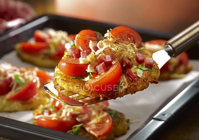 Pizza fritters on server — Stock Photo