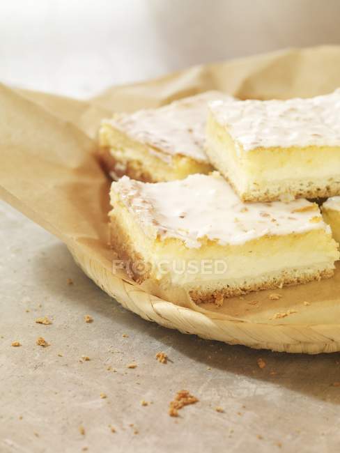 Four slices of coconut and quark cake — Stock Photo