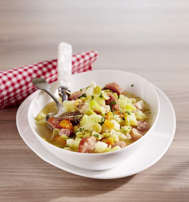 Luxembourg pea stew  on white plate with spoon and fork — Stock Photo