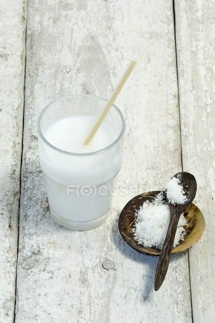 Glass of coconut milk — Stock Photo