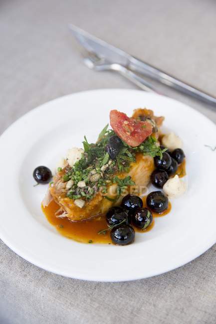 Pork with herbs and blueberries — Stock Photo