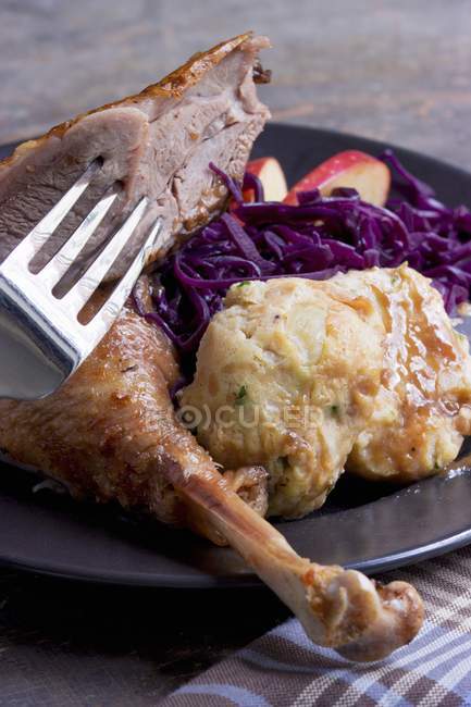 Duck leg with red cabbage — Stock Photo