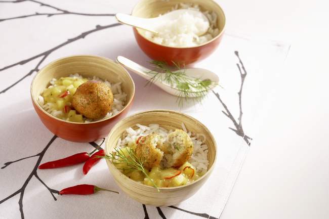 Cod balls in fruity curry sauce — Stock Photo