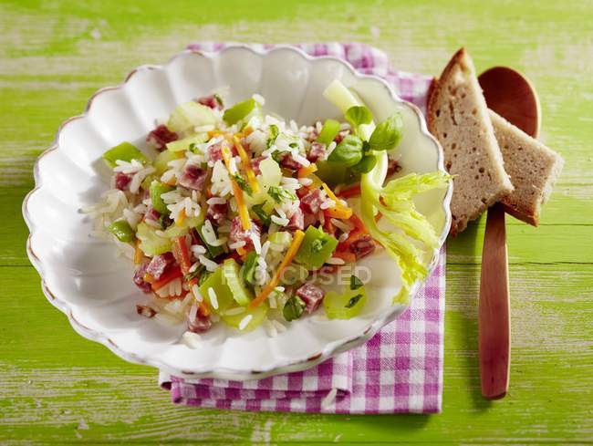 Rice salad with salami — Stock Photo