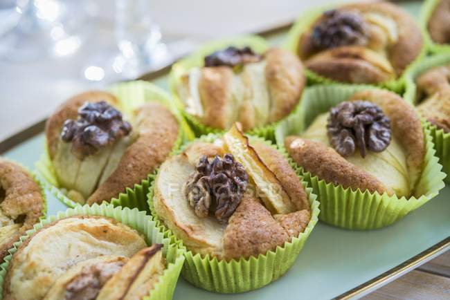 Apple muffins with walnuts — Stock Photo