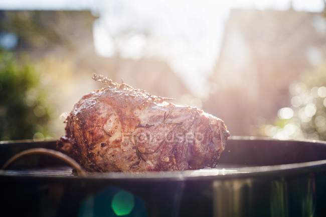 Knuckle of lamb on a barbecue — Stock Photo