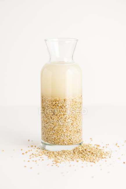 Softened oats on white background — Stock Photo