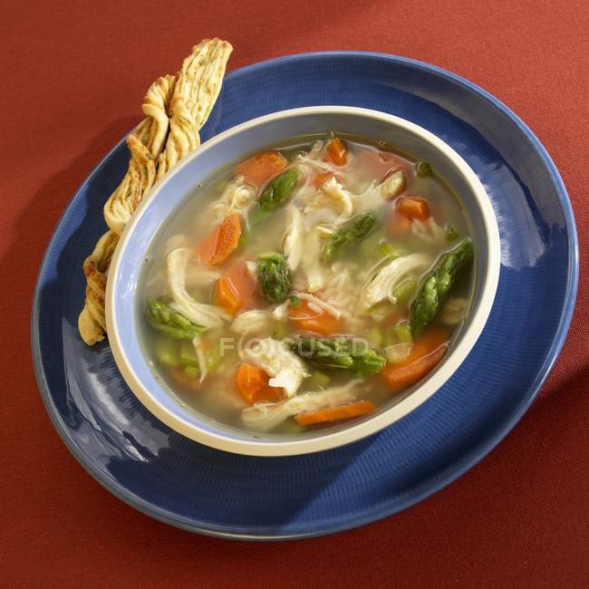 Chicken soup with carrots — Stock Photo