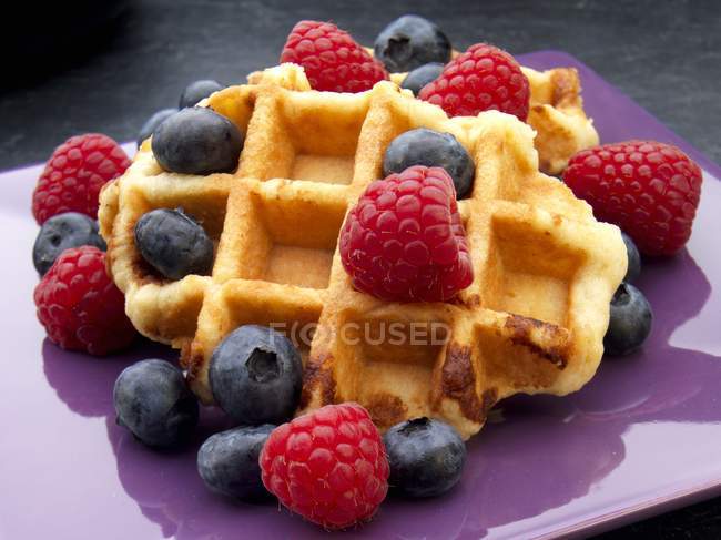 Waffles with fresh berries — Stock Photo