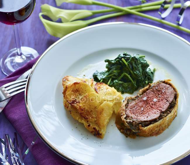 Fillet Wellington with spinach — Stock Photo