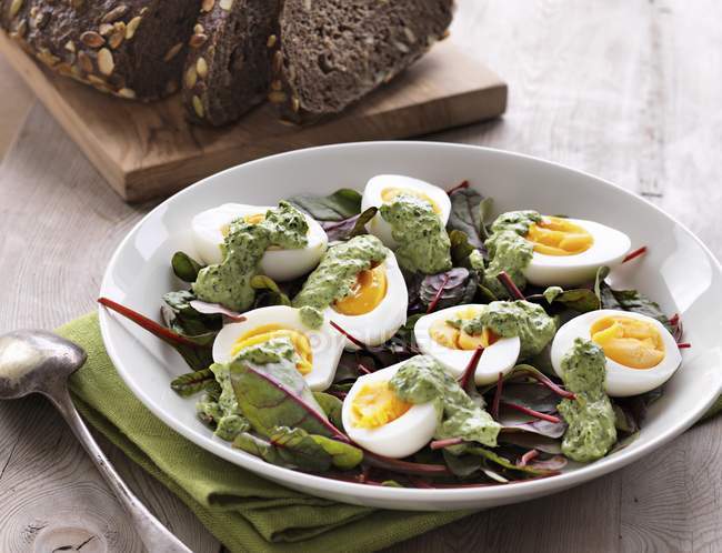 Boiled eggs with herb mayonnaise — Stock Photo