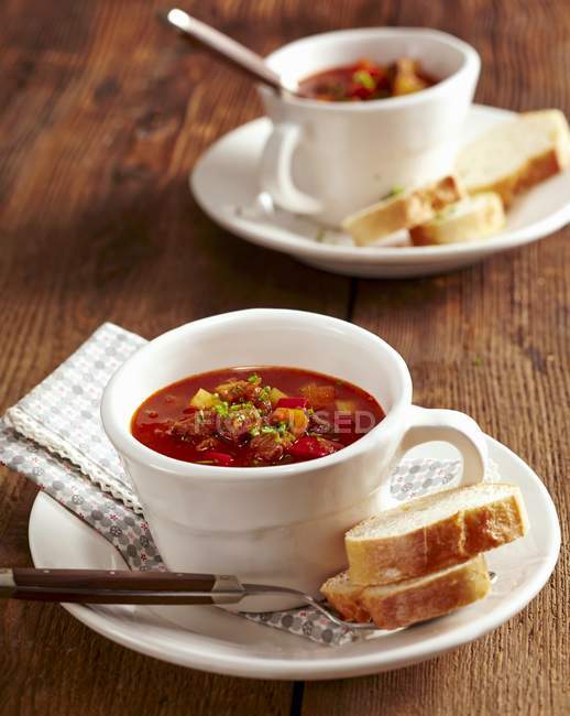 Goulash soup in cups — Stock Photo