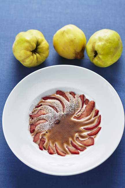 Closeup view of quince Gratin with icing sugar — Stock Photo