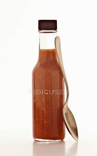 Hot chili sauce n the bottle — Stock Photo