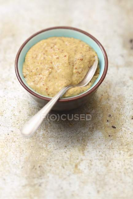 Mustard sauce in bowl — Stock Photo