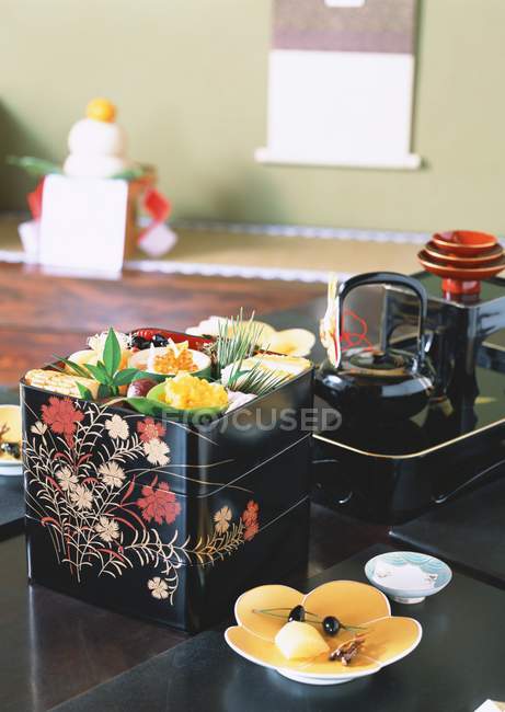 Closeup view of traditional Asian food in tin — Stock Photo