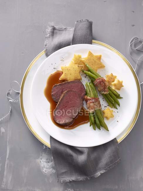 Beef fillet with polenta stars — Stock Photo