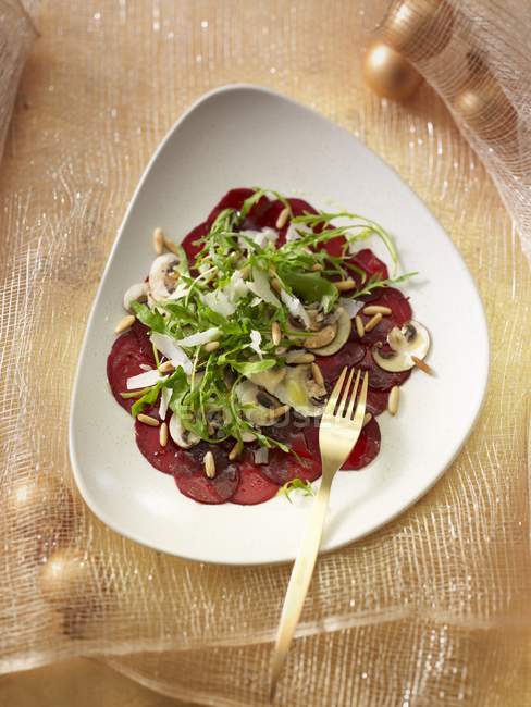 Beetroot carpaccio on plate — Stock Photo