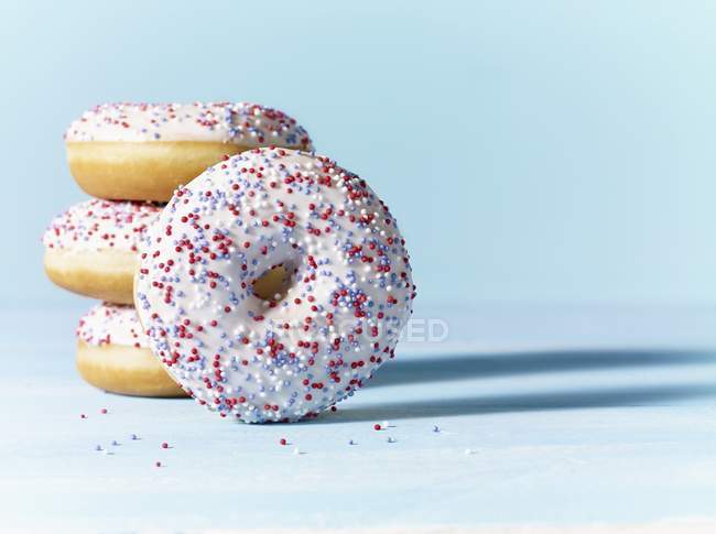 Doughnuts with white icing — Stock Photo