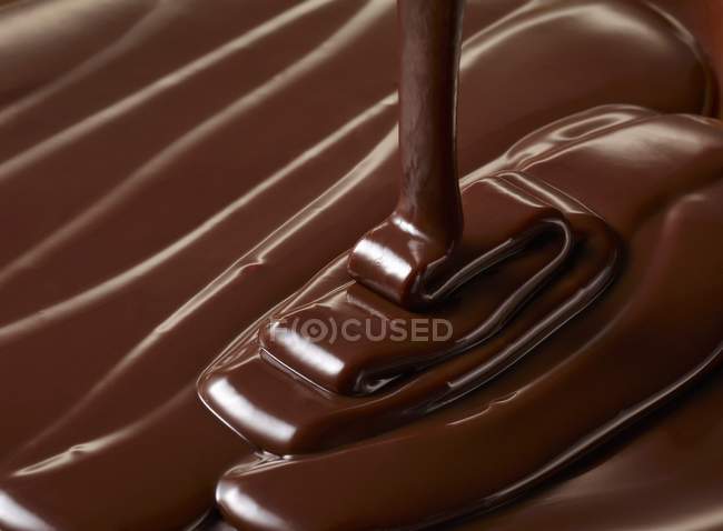Geschmolzene dunkle Schokolade — Stockfoto