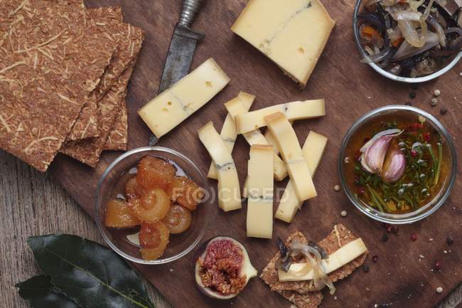 Morbier cheese on desk — Stock Photo