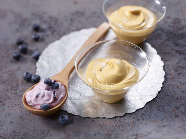 Closeup view of blueberry and sea buckthorn quark — Stock Photo