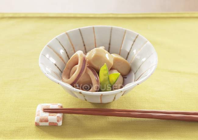 Squid and taro simmered in soy sauce — Stock Photo