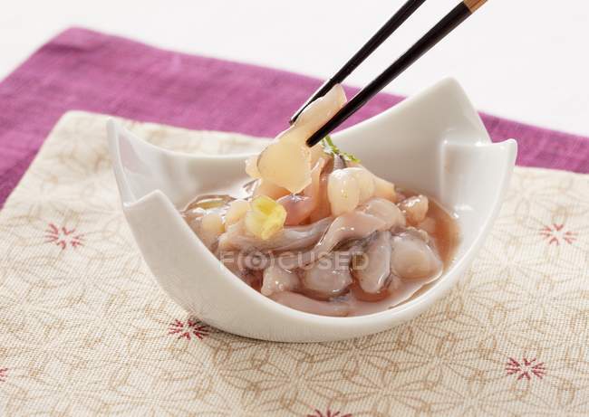Closeup view of fermented octopus flavored with wasabi — Stock Photo