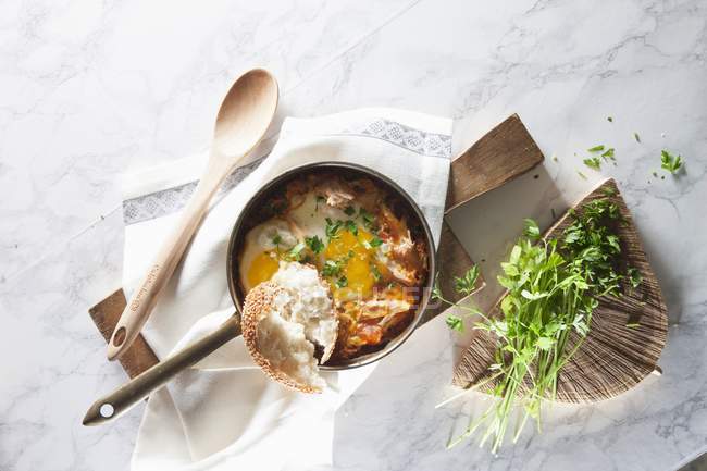 Top view of Shakshuka with poached eggs and tomato sauce — Stock Photo