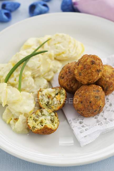 Fish balls with mayonnaise and potato salad — Stock Photo