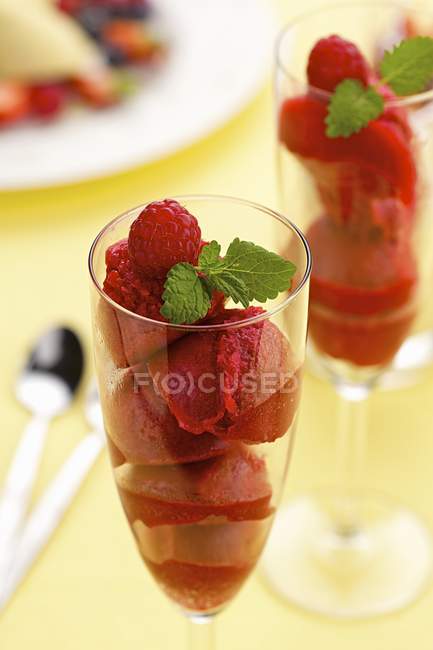 Raspberry sorbet in glass cups — Stock Photo