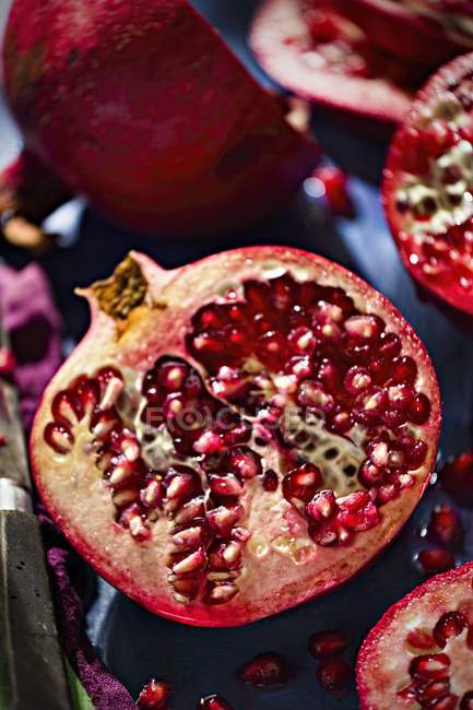Fresh halved Pomegranates — Stock Photo