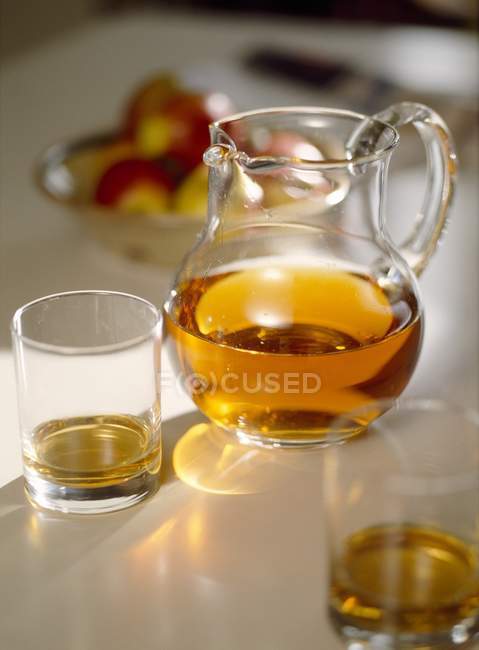 Apple juice in glasses — Stock Photo