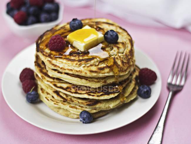 Stack of pancakes with butter — Stock Photo