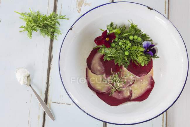 Beetroot carpaccio with herbal salad — Stock Photo