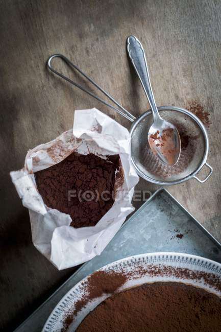 Chocolate cake on metal tray — Stock Photo