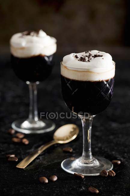 Coffee with blackcurrant and liqueur — Stock Photo