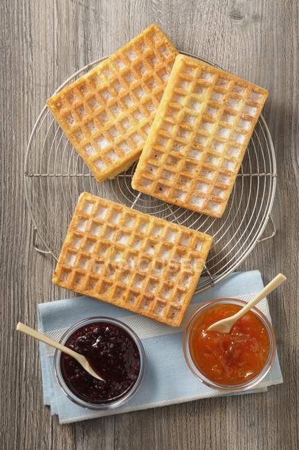 Waffles and jam on tray — Stock Photo