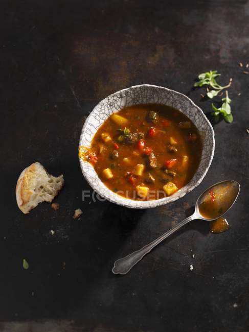 Goulash soup with bread — Stock Photo