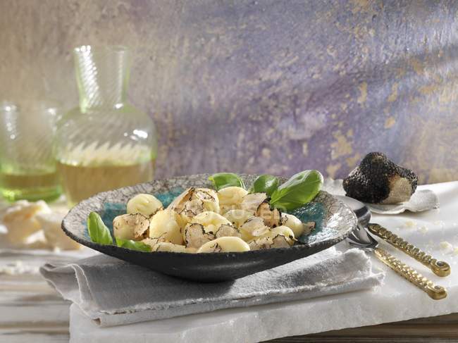 Gnocchi with grated truffles — Stock Photo