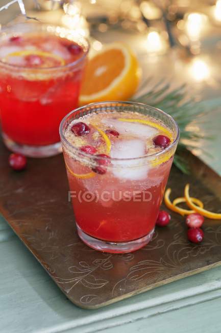 Cranberry cocktail with orange — Stock Photo