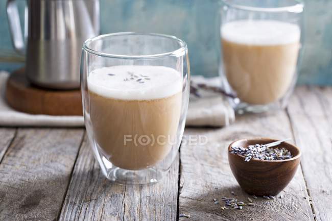Earl Grey latte in glass with lavender — Stock Photo