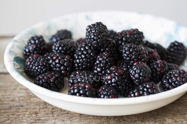 Fresh Blackberries in bowl — Stock Photo