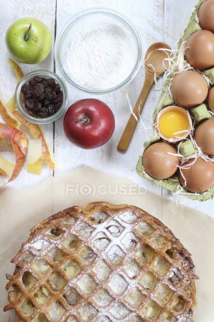 Apple cake on a wire rack — Stock Photo