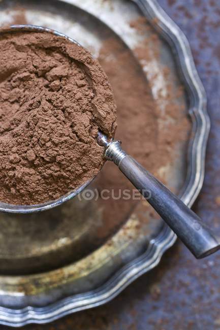 Bowl of cocoa powder — Stock Photo